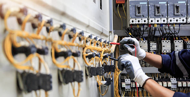 Professional Electrician technician working in Quinlan, TX